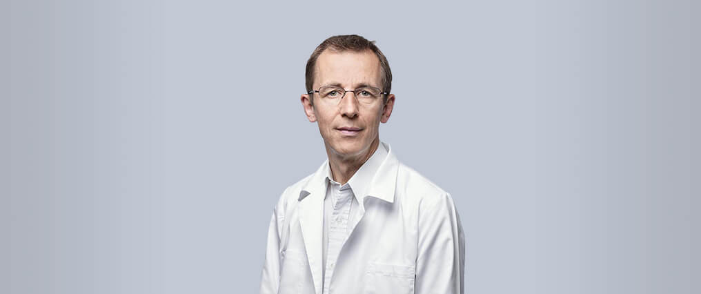 Dr CLAUDE OPPIKOFER